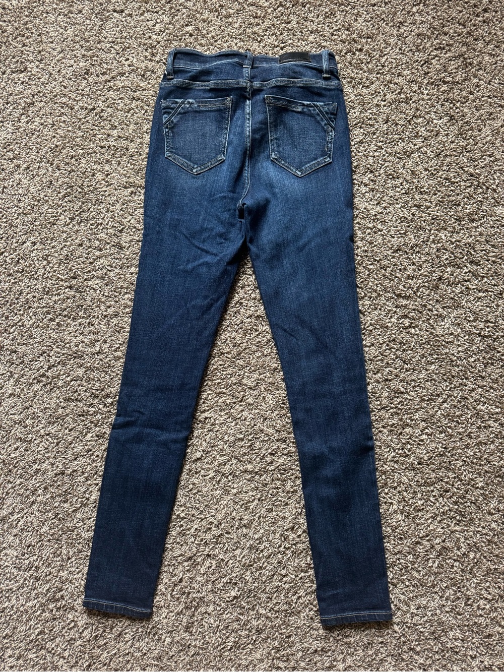 Buckle black skinny jeans